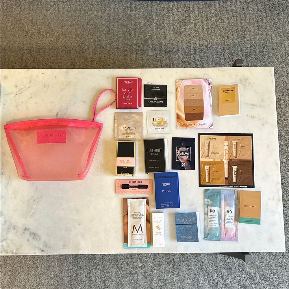 Bright pink, Nordstrom beauty cosmetic case with 17 beauty samples